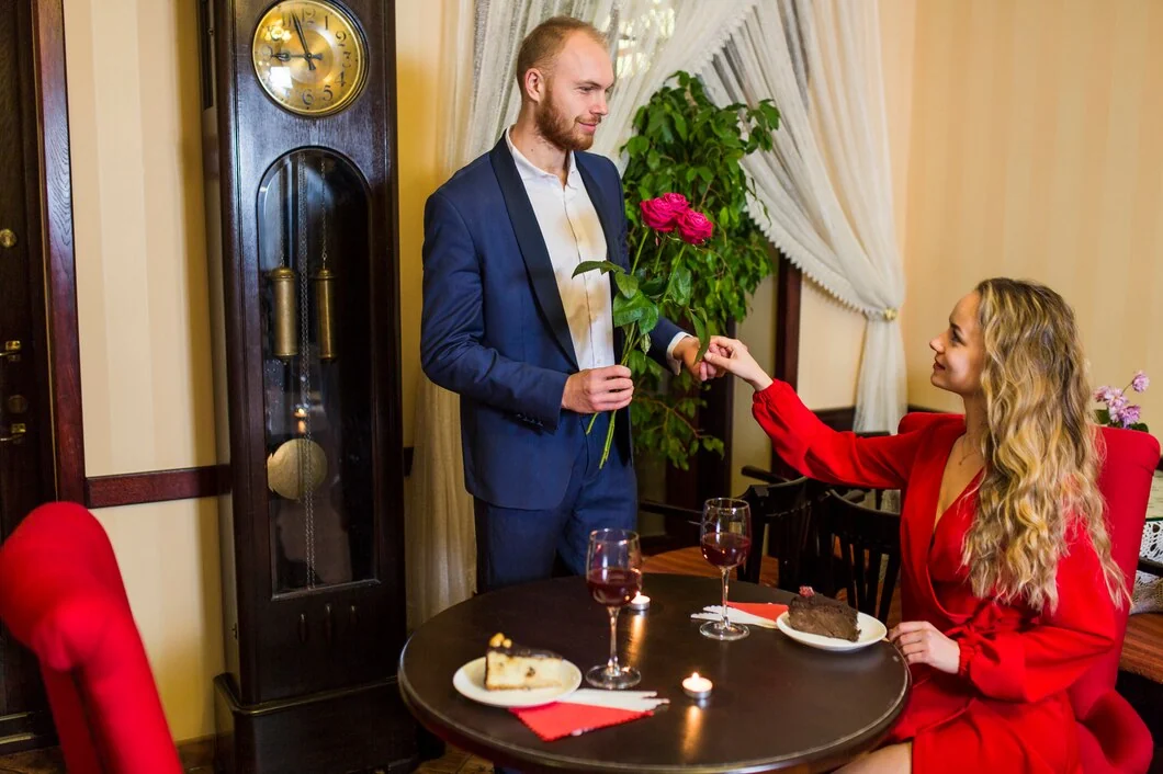 Hotel guest receiving flowers at a table